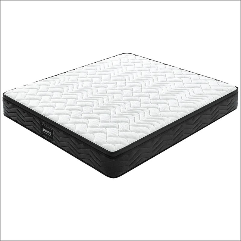 Black and white mattress with wave-stitched quilting on minimalist bed frame.