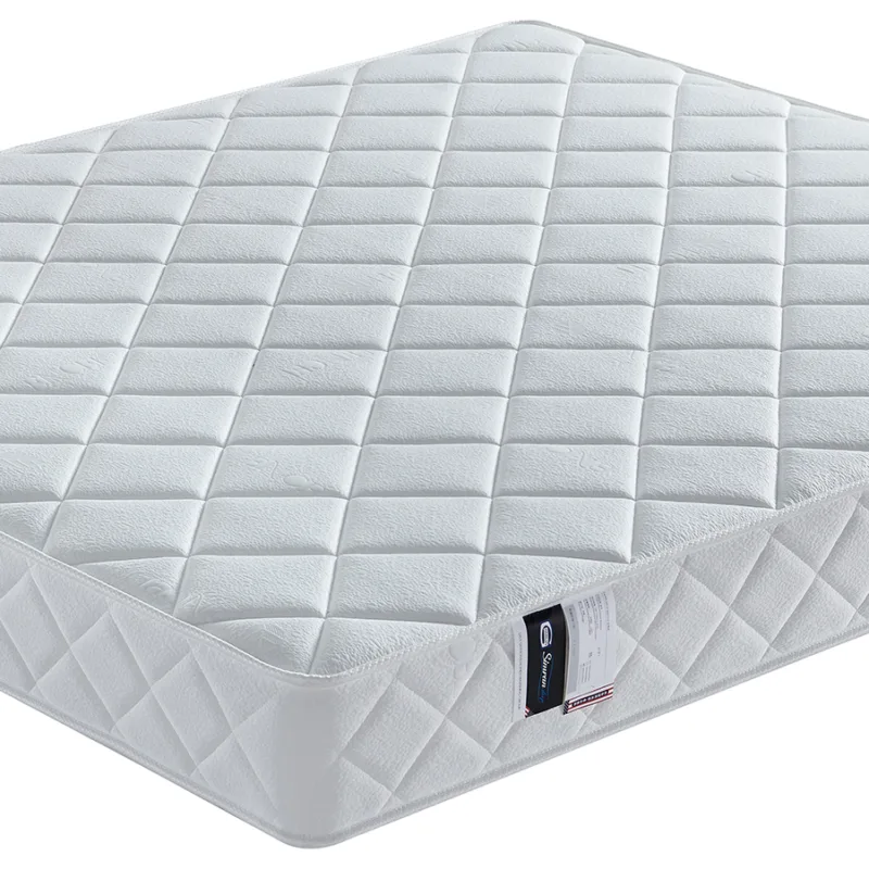 Compressed innerspring mattress with diamond-quilted top and textured side panels