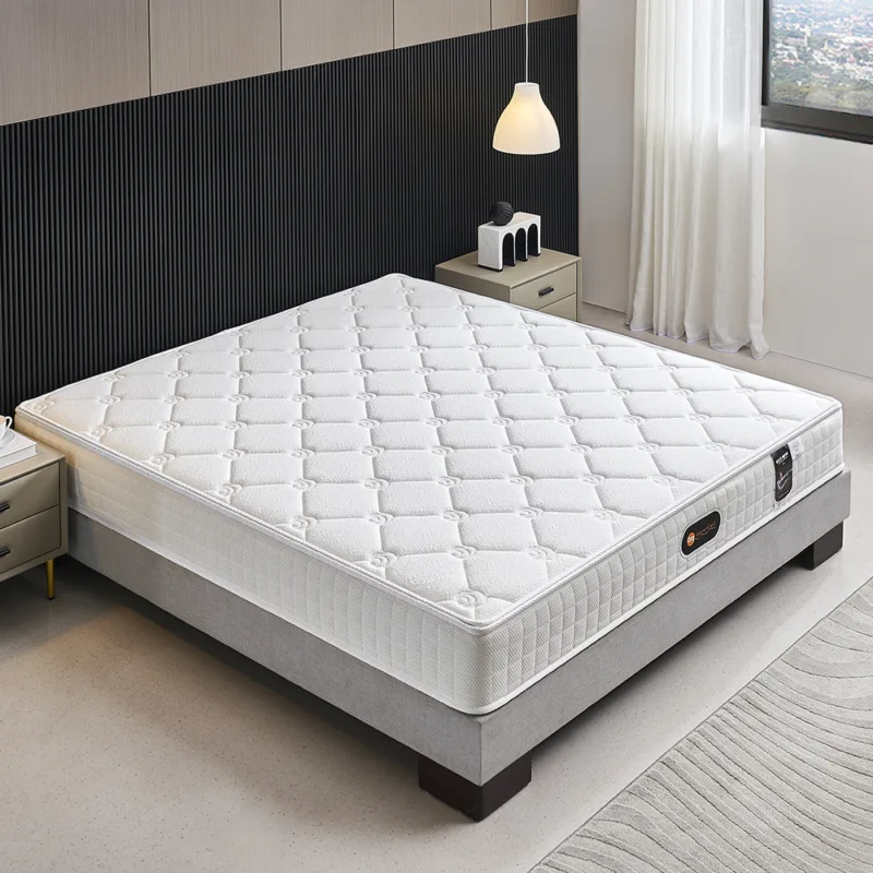 hite independent pocket spring mattress with quilted diamond tufting and light grey piping.
